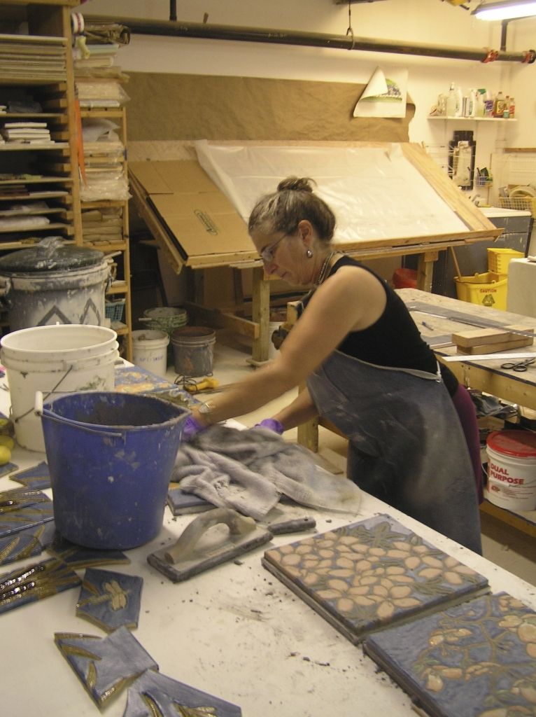 Karen Singer fabricating custom ceramic tiles for outdoor use
